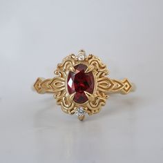 Read about our payment plans before proceeding. In the heart of this exquisite Faith ring, a crimson spinel nestles, a gem of nature's tender artistry. Embraced by delicate scroll-like motifs, each curve whispers tales of timeless elegance, bestowing upon it a vintage flair that dances with the echoes of ages past. Crafted by skilled hands, this ring is available in your choice of 14K and 18K yellow gold, rose gold, and white gold. All orders come in our Tippy Taste ring box. This ring is handmade and designed in NYC. 14K or 18K solid gold Natural red spinel, 6*4mm Natural round diamonds. SI clarity, GH color, 0.02ct total carat weight 1.5mm ring band ** Tippy Taste Heirloom Collection is made to order. Please allow 3-4 week turnaround time. Shipping:Domestic: Free shippingInternational: F Gold Heirloom Ruby Ring With Gemstone Accents, Heirloom Gold Ruby Ring With Gemstone Accents, Heirloom Ruby Ring With Gemstone Accents, Fine Jewelry Red Ruby Ring With Intricate Design, Heirloom Red Jewelry With Gemstone Accents, Red Heirloom Jewelry With Gemstone Accents, Heirloom Red Gemstone Jewelry, Exquisite 14k Gold Ruby Ring Gift, Exquisite 14k Gold Red Rings