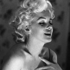 a black and white photo of marilyn monroe