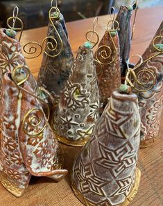 Pottery ornaments are handmade in Helena, Montana by Donna Erickson, an Apache and Cherokee descendant. Each ornament, includes an interior bell, and measures approximately 7" from hook to end. Helena Montana, Clay Christmas, Pottery Classes, Xmas Decor, Pottery Ideas, Handmade Ornaments