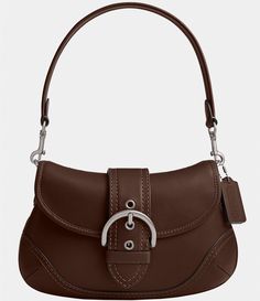 From COACH&#x2C; the Glovetanned Leather Soho Shoulder Bag features:Regenerative glove-tanned leatherInside zip pocketMagnetic snap closure&#x2C; fabric liningDetachable handle with an approx. 7.25" dropApprox.: 10.5" L x 6.25" x 2.75"Imported. Vintage Coach Ergo, Brown Saddle Bag, Coach Soho Bag, Winter Handbag, Winter Handbags, Miss Match, Tan Bag, Fancy Bags, Girly Accessories