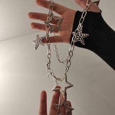 features: Stars and Starfish designed  style: Boho-hippie lenth of stars:   large - 5 cm /  small- 4 cm / starfish- 3.5 cm *Click the link to reach more fantrastic varieties of rings, earrings, necklaces, braceletc, anklets etc. https://www.etsy.com/uk/shop/SalihaDesigns?ref=shop_sugg *40% OFF on 3+ items. Use coupon CODE003 at the checkout. https://www.etsy.com/uk/shop/SalihaDesigns?coupon=CODE003 All photos on my page are original, not edited. *A great gift for lover of long necklace . *Two di Punk Style Star Charm Jewelry As Gift, Punk Style Star Shaped Metal Necklace, Punk Star-shaped Necklace For Parties, Trendy Star Charm Festival Jewelry, Star Charm Necklace For Festivals, Festival Star-shaped Silver Jewelry, Metal Starfish Charm Jewelry, Party Necklaces With Star Charm, Bohemian Silver Necklace With Starfish Charm