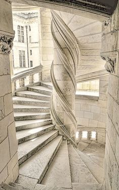 an artistic spiral staircase in black and white