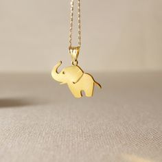 14k Gold Elephant Pendant Plate Elephant Necklace Gold Minimal Animal Pendant 14k Solid Gold Charm Necklace. Unique custom necklace who loves Elephants!! ➤ Necklace Details * 14K Yellow Gold * Chain Gold Color Options; 14K White, Yellow, Rose Gold * Gold chain width: 0.25*0.30 millimeter ➤ Gold Elephant Pendant Details * Elephant Pendant width: 15 millimeters * Elephant Pendant length: 12 millimeters * Ready to Ship 1-2 Business Days 💍 ISEA Jewels' pieces are handcrafted by 10-15 years of exper Handmade 14k Yellow Gold Charm Necklace, Gold Elephant Pendant, Elephant Necklace Gold, Solid Gold Charms, Gold Elephant, Animal Pendant, Elephant Necklace, Elephant Pendant, Gold Charm Necklace