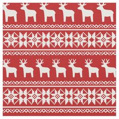 a red and white knitted pattern with reindeers on the side, all in different sizes