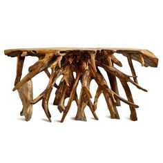 a wooden table made out of branches on a white background