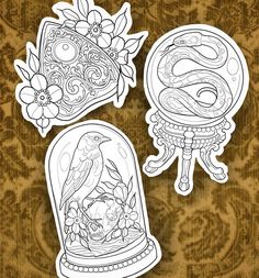 two snow globes with flowers and birds in them on a brown wallpaper background