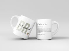 two coffee mugs sitting side by side with the words doctor and dr on them