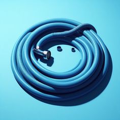 a blue hose laying on top of a blue surface