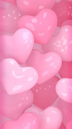 many pink hearts floating in the air