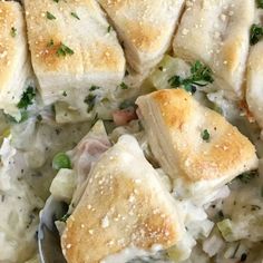 a close up of food on a plate with broccoli and chicken casserole