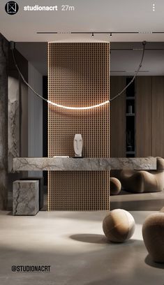 the interior of a modern bathroom with stone and wood