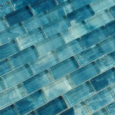 a close up view of blue glass tiles