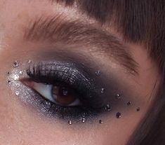 Black Concert Makeup, Black Eyeshadow With Rhinestones, Black Glittery Eyeshadow, Black Sparkle Eyeshadow, Silver Eye Makeup With Gems, Black And Silver Star Makeup, Dark Glittery Makeup, Darker Eyeshadow Looks, Dark Makeup With Rhinestones