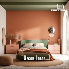 a bedroom with an orange accent wall and white furniture, including a green headboard