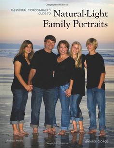 a family posing for a photo on the beach in front of the ocean with text that reads natural - light family portraits