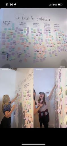 two women standing next to each other in front of a wall with sticky notes on it