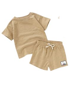 🌿 Introducing our fabulous Organic Cotton Shirt and Short Set! 🌿 👕 Made with 100% pure organic cotton, this set is not only super soft and gentle on your little one's skin, but it's also eco-friendly and sustainable 🌎. We believe in protecting the planet for future generations, and that's why we've carefully sourced materials that are both comfortable and kind to the environment. 🌈 The vibrant colors and delightful patterns of our Organic Cotton Shirt and Short Set will make your child stan Spring Cotton Crew Neck Sets, Brown Cotton Playwear Set, Casual Beige Tops For Playwear, Solid Color Crew Neck Sets For Summer, Solid Color Crew Neck Summer Set, Summer Solid Color Crew Neck Set, Summer Crew Neck Set In Solid Color, Casual Cotton Sets Plain, Casual Brown Playwear Sets