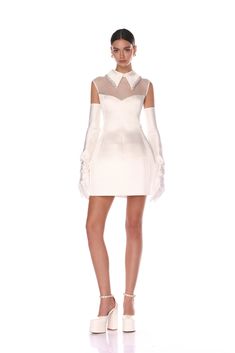 Elevate your look with the Simone Bridal Mini Dress from La Danse Blanche: a chic fusion of elegance and modernity. High neckline with an embellished collar  Sheer décolleté with sweetheart neckline Structured skirt Keyhole back opening Gloves not included Dress With Gloves, Runway Outfits, Embellished Collar, Casual Wedding Dress, Split Maxi Dress, Collars For Women, Shop Maxi Dresses, Fall 2024, White Mini Dress