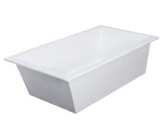 a large white tub sitting on top of a white floor