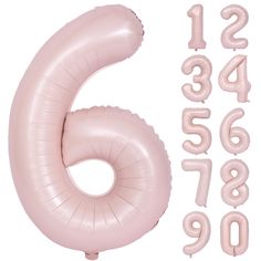 the number six is made out of pink balloons and it's balloon type numbers