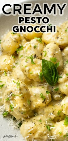 creamy pesto gnocchi in a white bowl