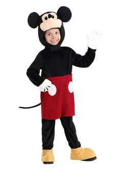 a young boy dressed in mickey mouse costume