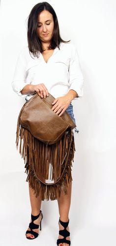 Western Fringe hobo bag - brown leather bohemian  bag, Western shoulder bag, Bohemian Women bag, Western fringe purseThis crossbody bag is the perfect size to carry your daily essentials in style! It is made from high quality leather.This leather bag is a perfect everyday bag! There is a lot of space and you can put there everything in your everyday life.* Top zipper closure* Outer slip pocket on the back* Includes internal pockets for mobile phone and other small items.Important note:The flap o Leather Fringe Clutch Bag, Brown Fringe Bag For Everyday Use, Brown Fringe Bags For Daily Use, Brown Fringe Hobo Shoulder Bag, Brown Fringe Tote Shoulder Bag, Brown Fringe Bag For Daily Use, Daily-use Brown Bag With Fringe, Daily Use Brown Fringe Bag, Brown Crossbody Hobo Bag With Tassels