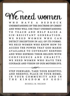 a framed print with the words we need women in black and white, against a wooden frame