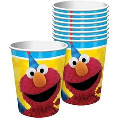 the sesame street party cups are decorated with elmo and his birthday hat on top