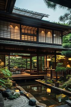 the inside of a japanese style house is lit up