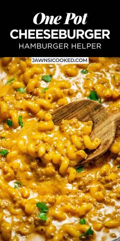 one pot cheesburger hamburger helper in a skillet with a wooden spoon