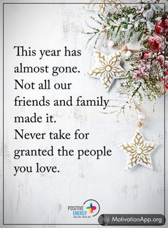 a christmas card with snowflakes hanging from the ceiling and an inscription that reads,'this year has almost gone not all our friends and family made it never