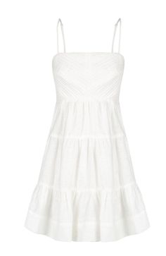 Is there such a thing as too feminine? We don’t think so. the Maya Linen Mini Dress by Shona joy is a gorgeous linen blend piece that features an open back with tie detail. A take on the iconic baby doll style the tiered skirt is flouncy and fun. Maya is definitely a staple for your bridal wardrobe that will certainly make her way into your honeymoon attire. Did we mention she has pockets? Please note this item is only eligible for exchange or store credit. Luxurious linen blend with a slight sh Honeymoon Attire, Bridal Wardrobe, Tiered Mini Dress, Flare Top, Shona Joy, Linen Mini Dress, Luxury Linen, Romper With Skirt, Tiered Skirt