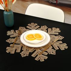 a white plate topped with orange slices on top of a table