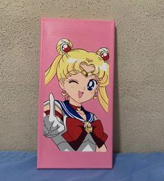 a pink canvas with sailor girl on it