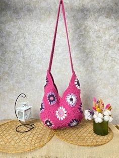 You can reflect your bohemian style with Hanmade knitting crochet bag. The harmony of colors and hand-knitted vintage style can turn you into a fashion icon. The thread used is a cotton thread that is specially produced for crochet tote bags, does not stain and does not deteriorate when washed. The colors will definitely not fade. It has a strong handle that won't slip off your shoulder. Knitting purse has a lining with a pocket inside. Your books, make-up bag, glasses, wallet and hygiene items Sac Granny Square, Diy Crochet Bag, Pink Shoulder Bag, Crochet Shoulder Bag, Granny Square Bag, Crochet Tote Bag, Beautiful Handbags, Afghan Pattern, Crochet Tote