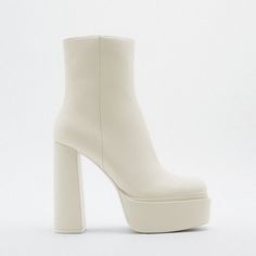 Nwt White Round Toe Platform Ankle Boots, 10 Brand New Zara Platform Ankle Boots In White, 10 High Heel (~5.1in/13cm) Platform Ankle Boot W/ Round Toe & Inner Side Zip Closure Increased Comfort W/ Airfit's Flexible Technical Sole 100% Polyurethane Upper W/ Mixture Of Polyester (90%) & Polyurethane (10%) Lining, 100% Polyester Insole & 100% Thermoplastic Rubber Sole Thanks For Looking!!! Chic Chunky Platform High Ankle Boots, Chic High Ankle Boots With Chunky Platform, Cream Platform Boots For Party, Chic High Ankle Platform Boots With Padded Heel, Cream High Heel Platform Boots, Beige Platform Boots With Pointed Toe, Cream High Heel Winter Boots, Cream High Ankle Platform Boots For Fall, Chic Platform Ankle-high Heeled Boots