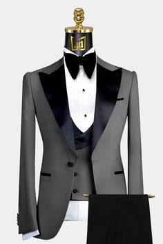 This modern charcoal grey peak lapel tuxedo suit is finely crafted from high-quality material, durable and timeless. The single-breasted gray dinner jacket is fully lined and has three exterior pockets. The slim-fit jacket has two functional breast pockets, one interior and one exterior. The long-lasting fabric is comfortable and soft. This elegant grey tux lets you stand out from the crowd but keeps that classic look. The black peak lapel and the design details have a subtle black satin sheen t Latest Suit Styles, Mens Tux, Grey Tux, Peak Lapel Tuxedo, Tuxedo Prom, Grey Tuxedo, Prom Tuxedo