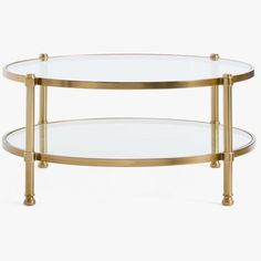 two tiered glass and brass coffee table