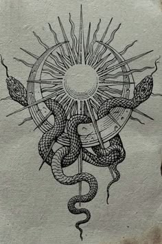 a drawing of a sun and snake on paper