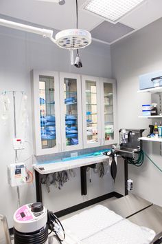 a hospital room with medical equipment in it