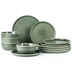 green dinnerware set on white background