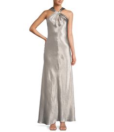 From Antonio Melani&#x2C; this dress features: Drapey satin fabrication Metallic sheen Halter necklineSleevelessA-Line slip silhouetteBack zipper with hook & eye closureFully linedFlounce hemlineMaxi dress length Approx. 46.5" length PolyesterProfessional dry cleaning onlyImported.Dillard's Exclusive. Slip Maxi Dress, Formal Wedding Guest Dress, Chiffon Shawl, Contemporary Dresses, Formal Dresses Gowns, Maxi Gown Dress, Dress Order, Maxi Dress Formal, Antonio Melani