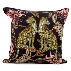 two cheetah sitting on top of a black pillow