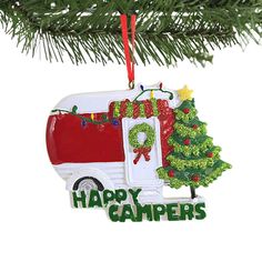 an ornament hanging from a christmas tree with the words happy campers on it