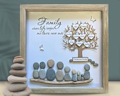 a family tree made out of rocks with a poem written on it and some stones stacked in the shape of hearts