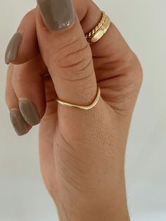 Our peak ring was made for stacking and is perfect if you’re looking for a simple band with an arch setting. Wear it as a thumb ring or stacked with our bold pearl ring. Handmade to order in 14k gold filled to withstand daily wear time after time. Tarnish-proof + safe to wear through hand-washing Ring Daily Wear, Dainty Thumb Rings, Good Thumb Ring, Rings For Thumb For Women, Thumb Ring Gold, Thumb Rings Aesthetic, Daily Wear Rings, Cute Thumb Rings, Rings Daily Wear