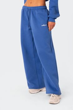 PRODUCT INFO Sweatpants Low rise waist Adjustable waistband Wide leg Embroidered logo Matching set Cotton, Polyester Model wears size S Model height is 5'9 Item care: Wash with similar color Matching Set Outfit Sweats, Wide Sweatpants, Sweatpants Blue, 2024 Wardrobe, Cute Sweats, Cute Sweatpants, Blue Sweatpants, Wardrobe Wishlist, Wide Leg Sweatpants