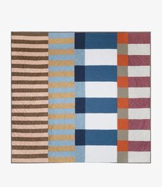 four quilts are arranged in different colors