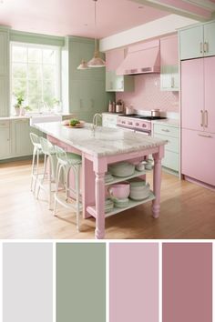 a kitchen with pink and green colors on the walls, an island in the middle